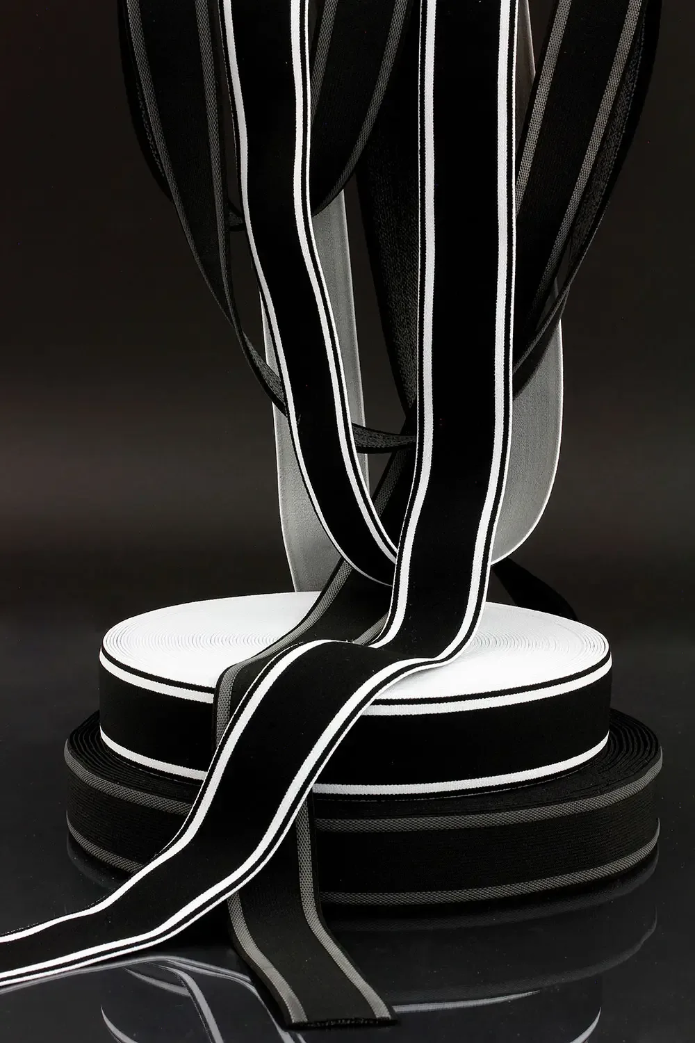 Black and white elastic tape woven rolled in rolls