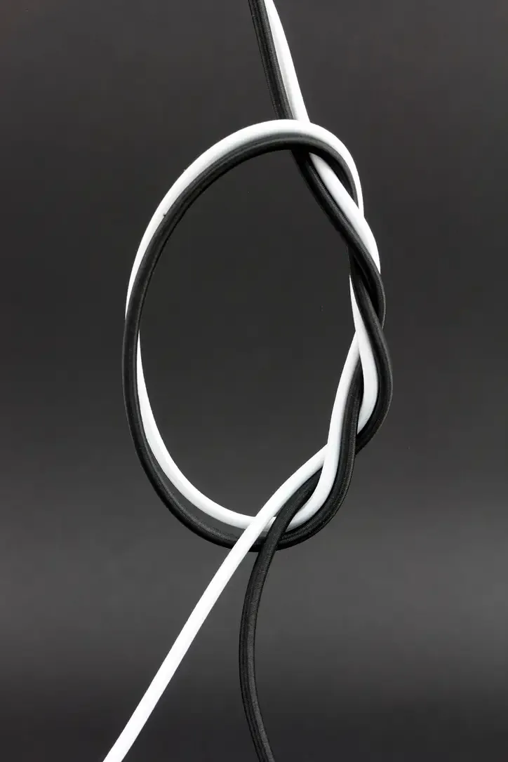 Black and white kedra wrapped in a loop