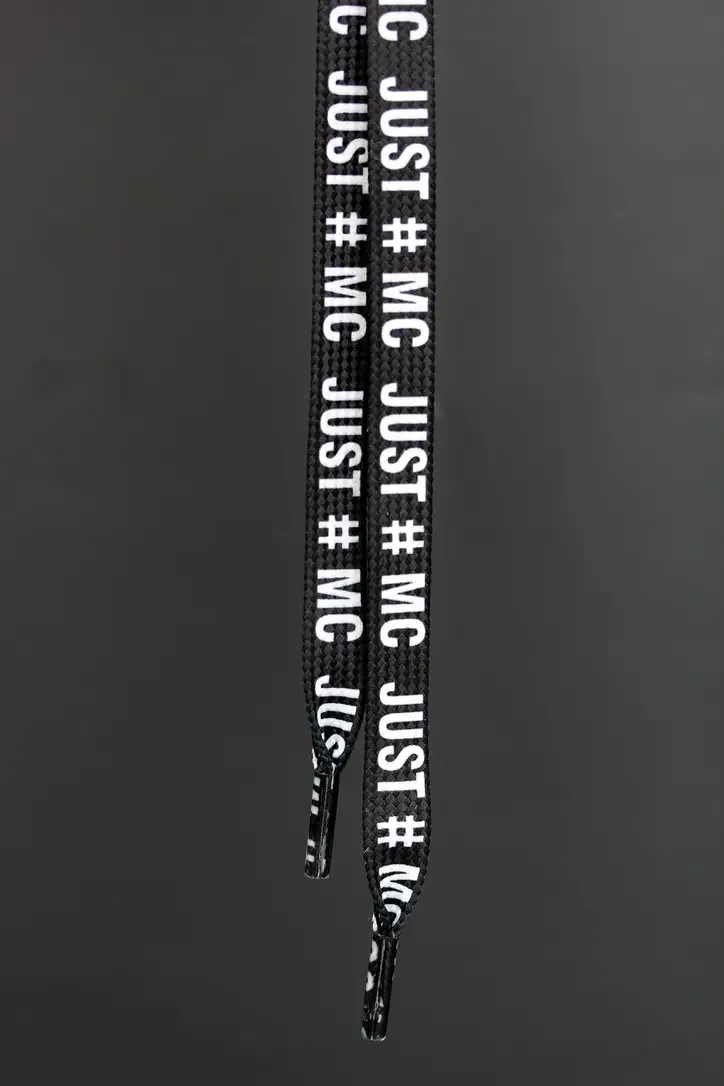 Black flat cord clothing with white subtitles