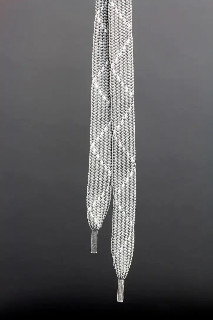 Bright woven shoelace shown in close-up