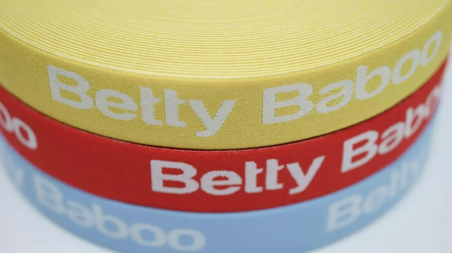 Colorful jacquard elastic tape with woven inscription