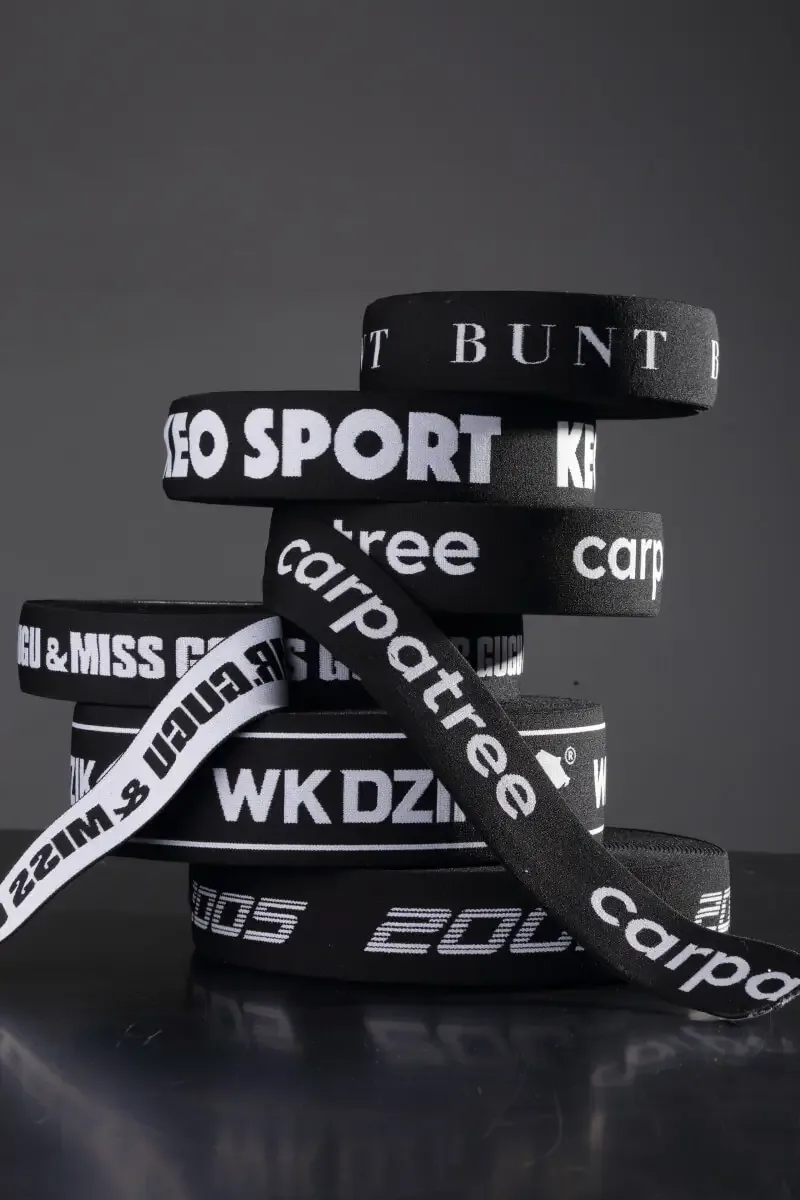Black collection jacquard elastic tape with white subtitles